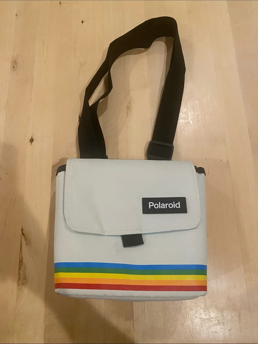 Polaroid White Messenger Bag with Rainbow Stripes and Black Strap